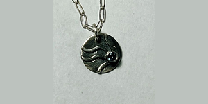 Come learn to set round gemstones in a tube setting and leave with a finished pendant!