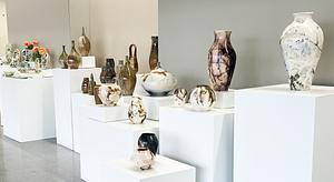 Pots on pedestals in the gallery
